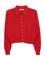 Red cardigan with buttons on a white background