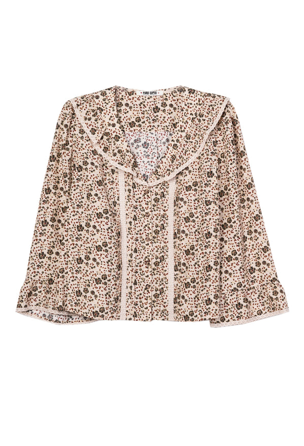 Cherry blossom floral patterned blouse on a white background