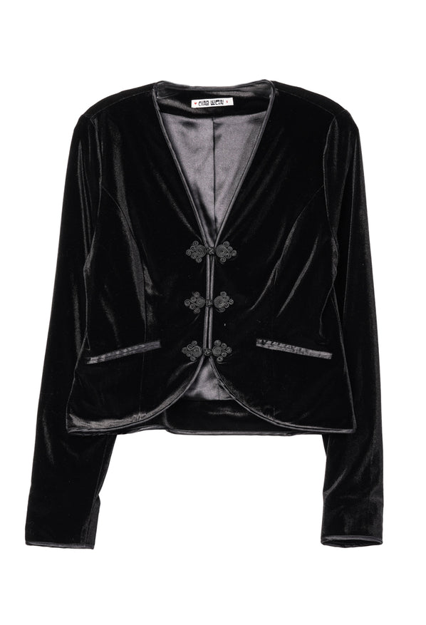 Black velvet blazer with three embroidered buttons and front pockets on a white background