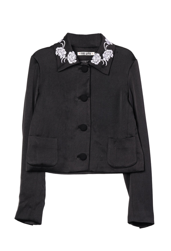 Black satin jacket with floral embroidery on collar against a white background