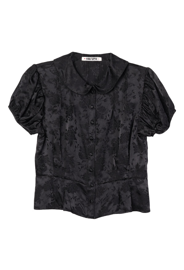 Black floral blouse with puff short sleeves and buttons down the front on a white background
