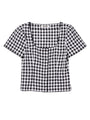 Short sleeve black and white checkered gingham top with buttons down the front on a white background