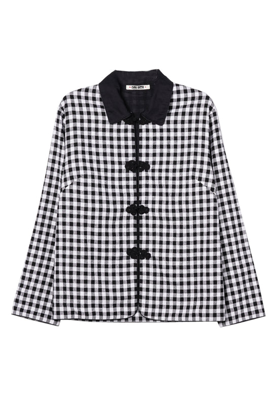 Flat lay image of black and white checkered gingham jacket with black collar and black embroidered buttons