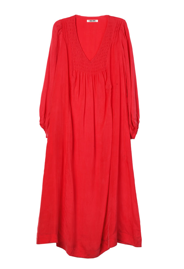 Flat Lay image of a long caftan red dress with long sleeves on a white background