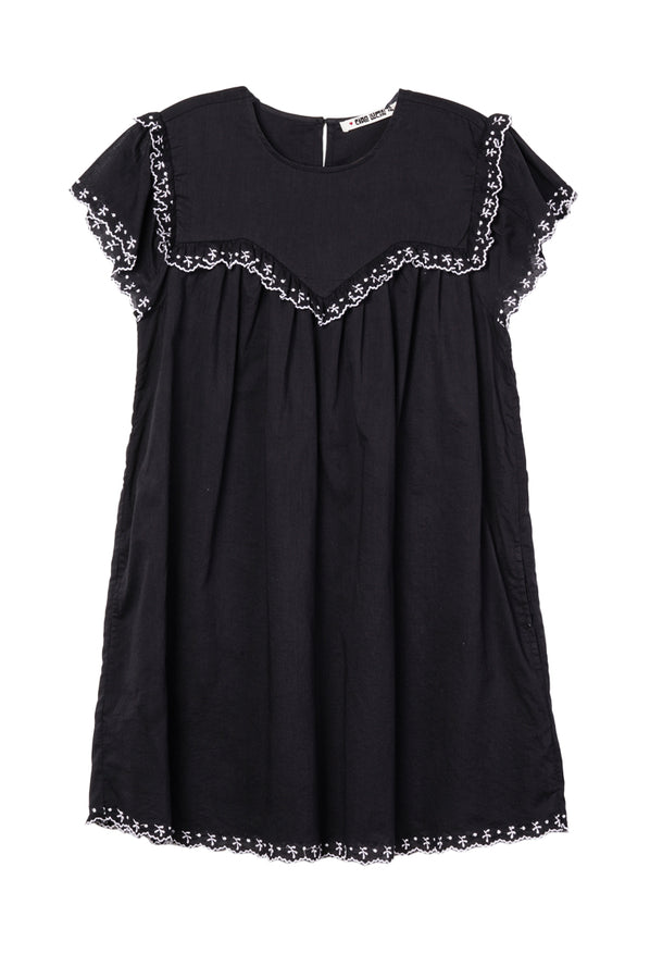 Black mini dress with cap sleeves and white floral embroidery across the chest, sleeve and hemline against white background.