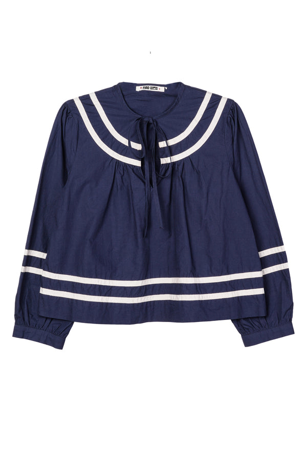 Navy blue blouse with white detailing along the collar, sleeves, and hem against a white background. 